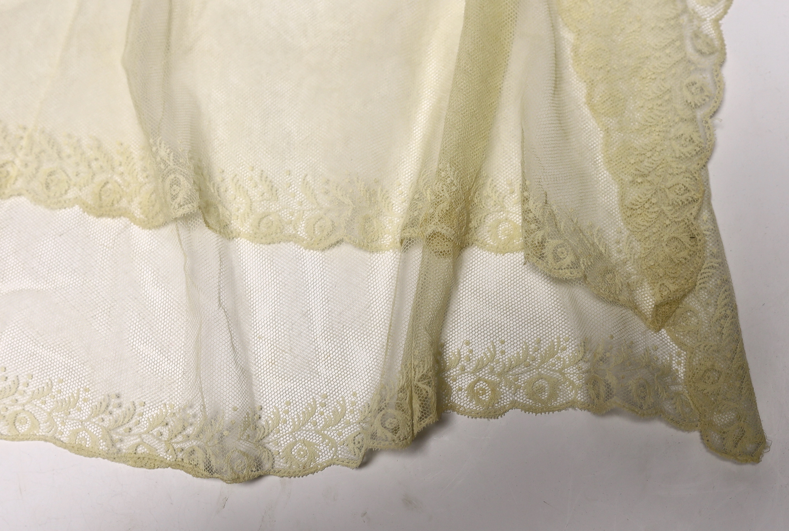 A long 19th century mixed Brussels lace collar, with 20 needle lace oval insertions, a similar wider Honiton bobbin lace collar and a machine lace bonnet veil